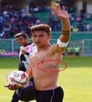 Dybala is a tattoo freak and has several tattoos on his body including an Arabic tattoo, two stripes on his left arm and a crowned football on his leg